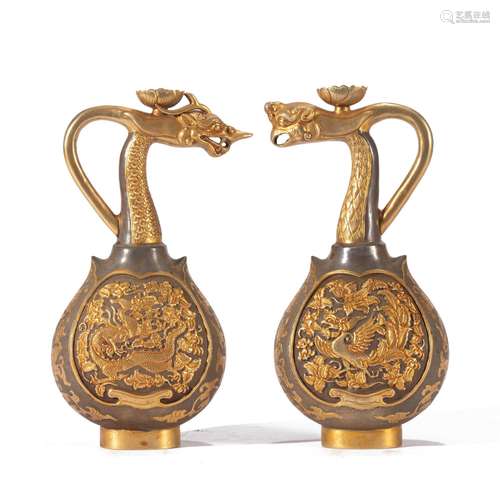 A PAIR OF CHINESE PARTLY GILT SILVER VASES