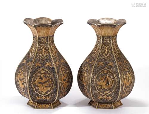 A PAIR OF CHINESE PARTLY GILT SILVER VASES