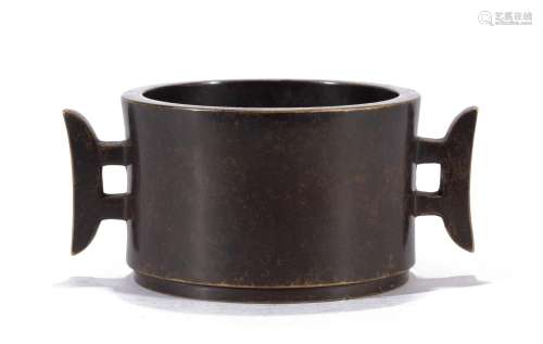 A CHINESE BRONZE CENSER WITH DOUBLE HANDLES