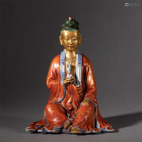 A CHINESE POLYCHROME PAINTED PORCELAIN GUANYIN