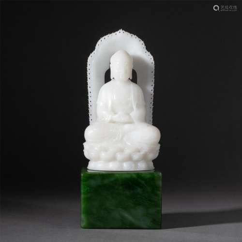 A CHINESE CARVED JADE FIGURE OF BUDDHA