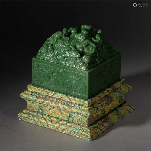 A CHINESE CARVED SPINACH GREEN JADE DRAGON PHOENIX SEAL