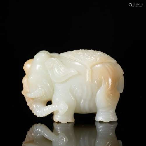 A CHINESE CARVED JADE ELEPHANT