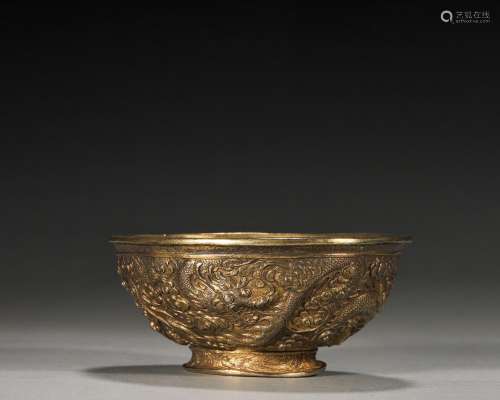 A dragon and cloud patterned gilding copper bowl