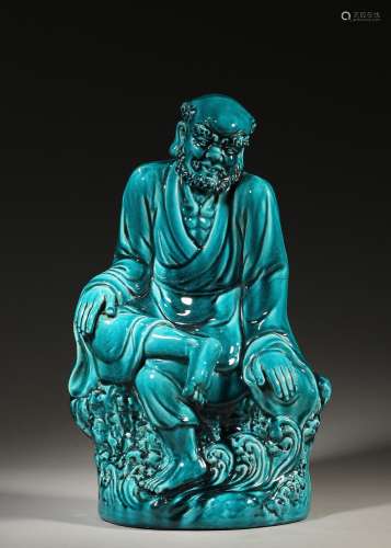A peacock blue glaze porcelain Dharma statuette,Qing Dynasty...