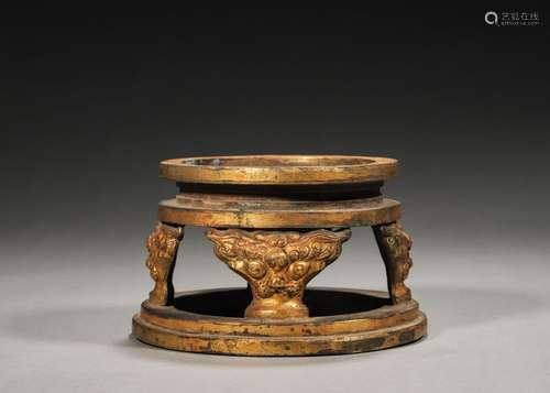 A beast face patterned gilding stone pedestal,Qing Dynasty,C...