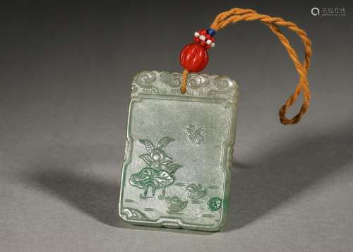 A lotus pond and mandarin duck patterned jadeite pendant,Qin...