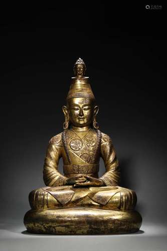 A gilding copper buddha statue