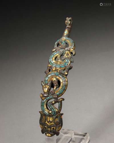 A gold and silver-inlaid bronze dragon hook,Han Dynasty,Chin...