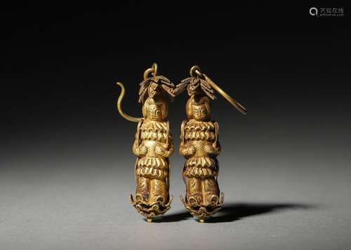 A pair of gilding silver figurine earrings,Qing Dynasty,Chin...