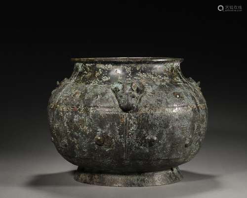 A patterned bronze pot with goat head shaped ears,Before the...