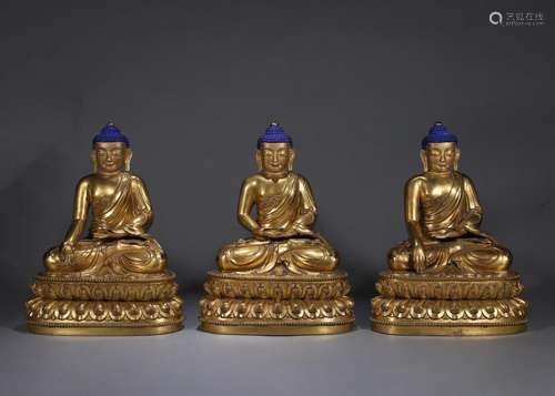 3 copper buddha statues