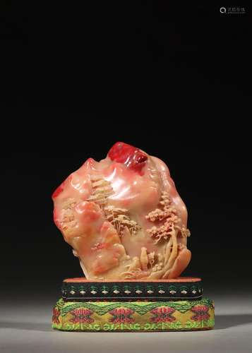 A landscape and figure patterned bloodstone ornament,Qing Dy...