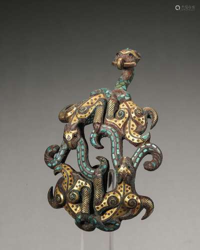 A gold and silver-inlaid bronze dragon hook,Han Dynasty,Chin...