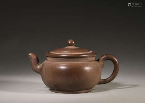 A round zisha clay teapot