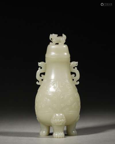 A taotie patterned double-eared jade vase,Qing Dynasty,China