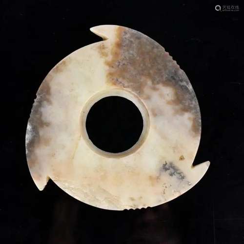 An Archaistic Style Jade Notched Disc