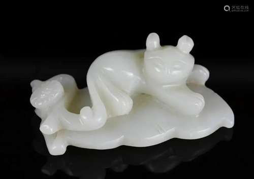 A White Jade Badger On Leaf Carving Qing