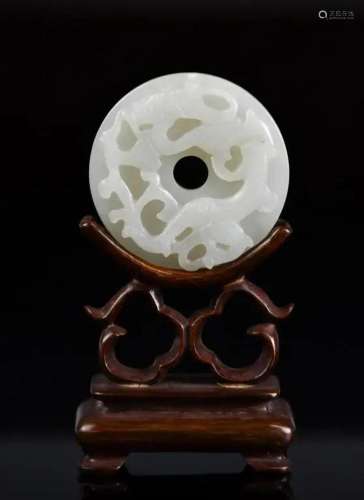 A White Jade Carved Bi Disc Ming