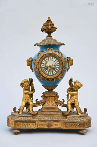 A clock in SËvres porcelain and gilt bronze, 19th century (5...