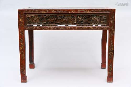 Chinese table in red lacquer with openwork panels, Qing dyna...