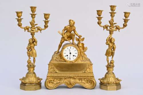 Three piece clockset in gilt bronze 'hunter' (clock 40x29x10...