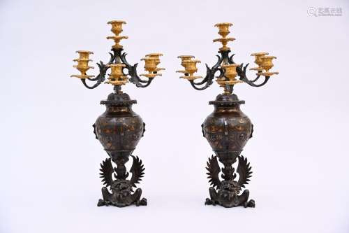 A pair of Japanese bronze vases mounted as candlesticks, 19t...