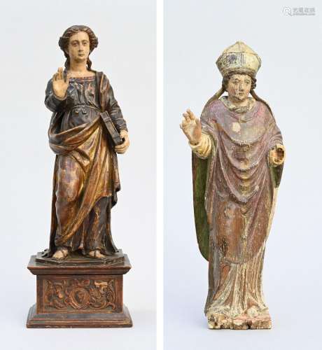 Two polychrome wooden statues 'Saint Lucy' and 'Bishop' 17th...