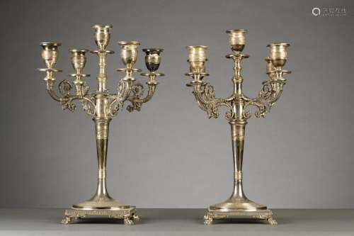 A pair of silver five-armed candlesticks (44x24cm) (weight 3...