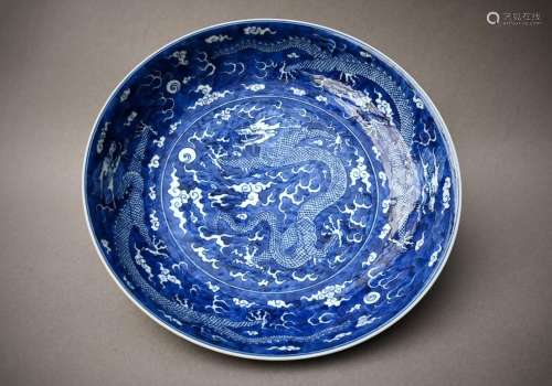 A dish in Chinese blue and white porcelain 'dragons', marked...