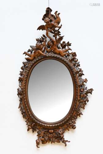 A fine sculpted wooden mirror 'putti' (152x85cm) (*)