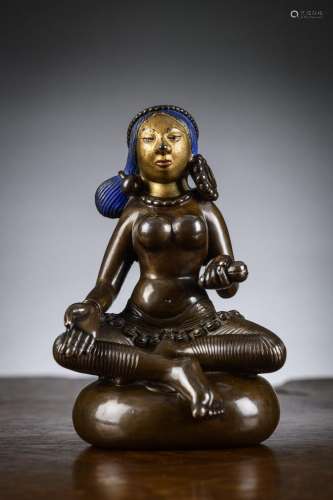 A rare bronze sculpture 'green tara', after a model by Choyi...