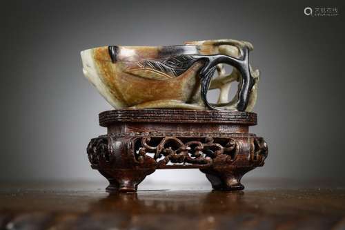 A Chinese jade brush washer in the form of a peach, Qing dyn...