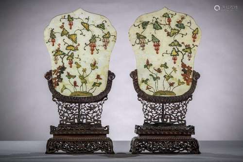 A pair of Chinese table screens with inlaywork on wooden ped...