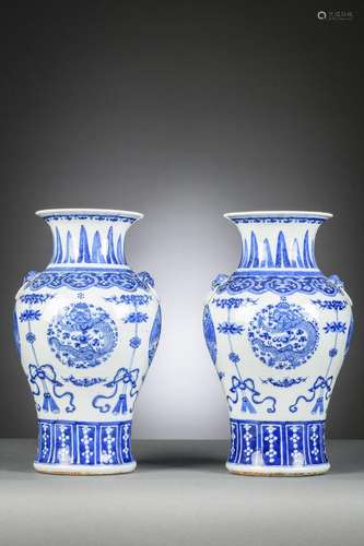 A pair of Chinese blue and white vases 'dragons and phoenixe...