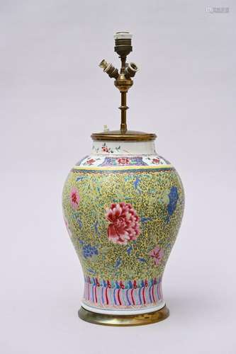 A Chinese famille rose vase with yellow background 'flowers'...