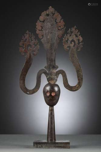 A Tibetan iron trisula with head of a citipati (h53.5cm) (*)