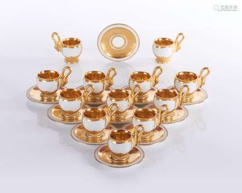 An unusual set of 12 DAGOTY (1771-1840) coffee cups and 11 s...