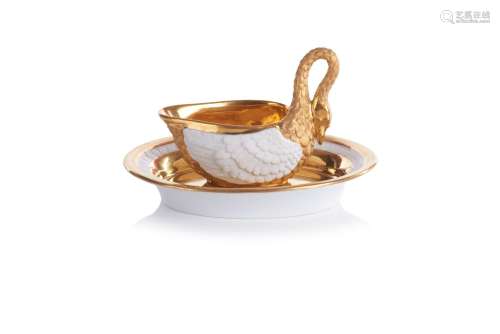 A swan shaped cup and saucer