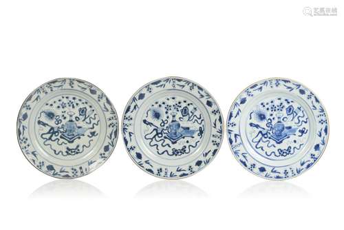 A set of three large plates