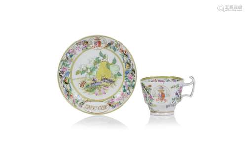 An armorial cup and saucer