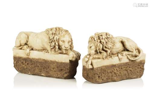 A pair of resting lions