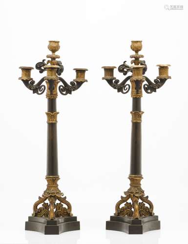 A pair of four branch Empire style candelabra