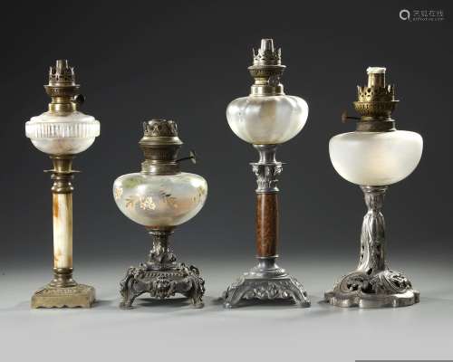 A GROUP OF FOUR FRENCH OIL LAMPS, CIRCA 1880
