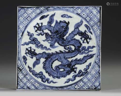 A CHINESE BLUE AND WHITE DRAGON TILE, 20TH CENTURY