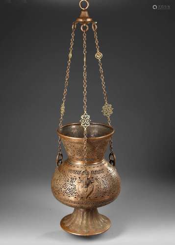 A MAMLUK-STYLE PIERCED BRASS MOSQUE LAMP, SYRIA OR EGYPT 19T...