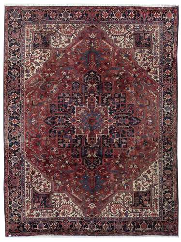 A PERSIAN HERIZ CARPET