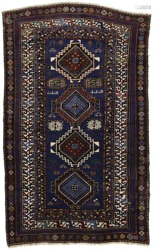 A KAZAK CARPET, AZERBAIJAN  FIRST HALF 20TH CENTURY