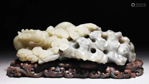 ELABORATELY CARVED QING DYNASTY BLACK & PALE CELADON JAD...