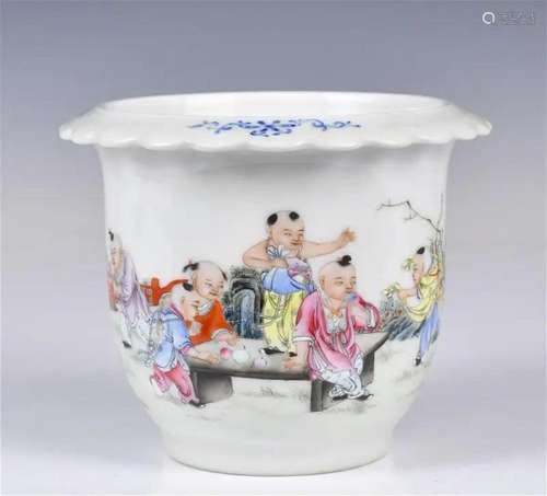 A Famille Rose Figural Flower Pot Qianlong Mk